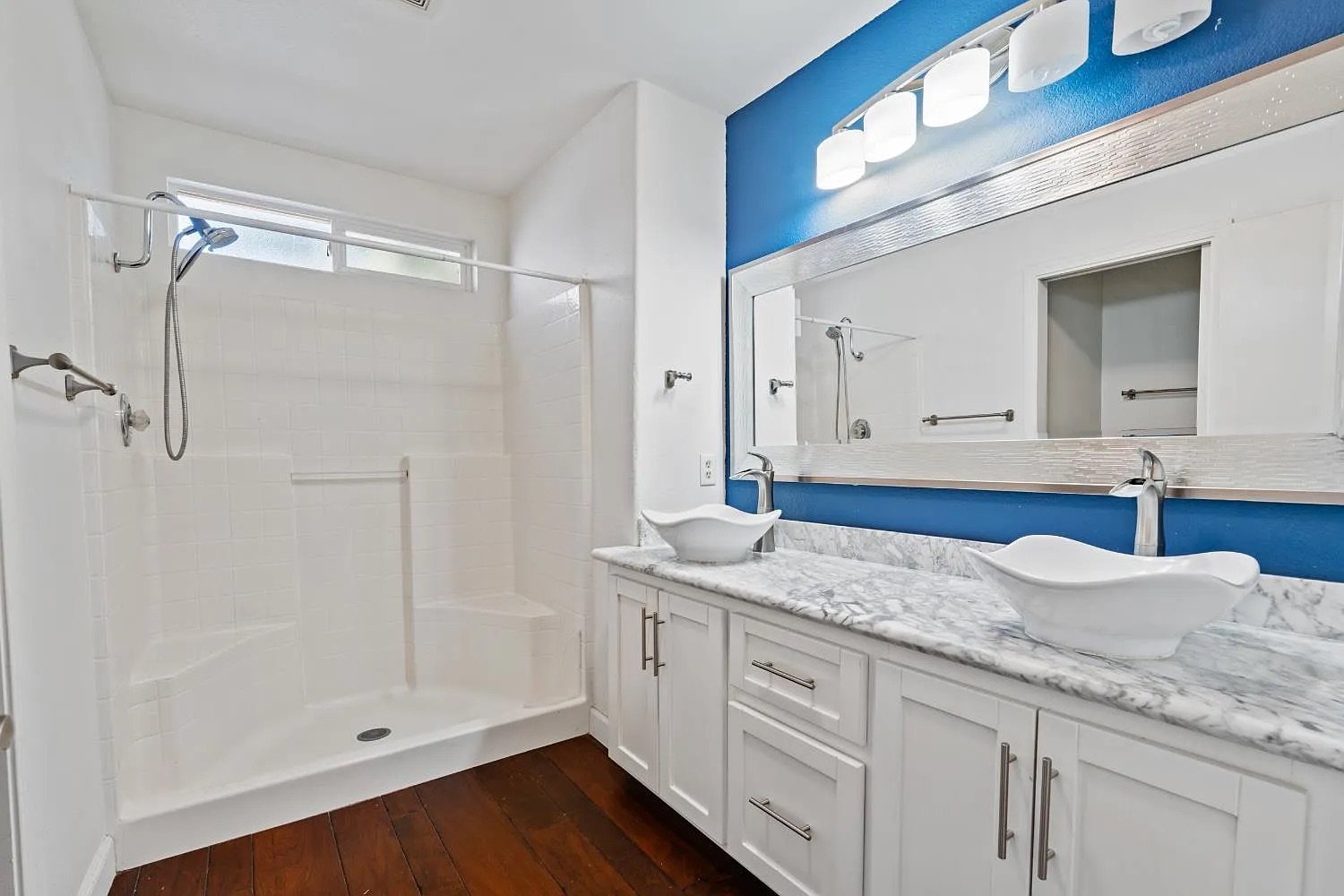 Primary Bathroom with Double Vessel Sinks, Marble, Walk-In Shower