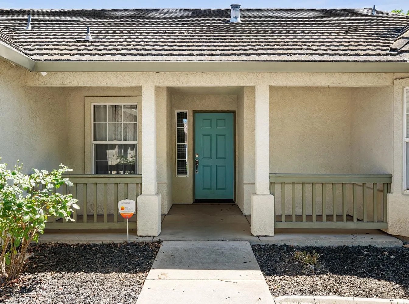 Front Porch with Teal Entry Door