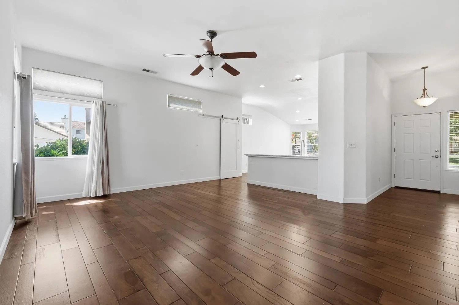 Open Living Area with Dark Hardwood Floors