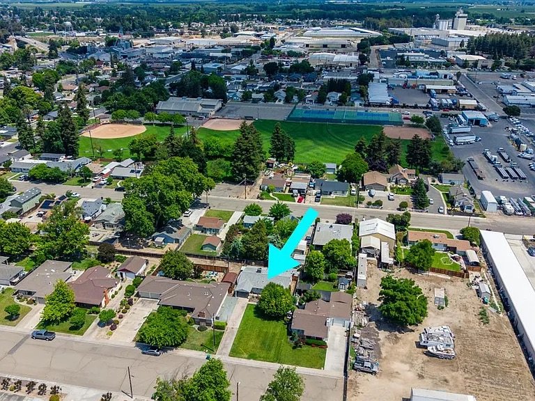 Aerial — neighborhood context with location arrow