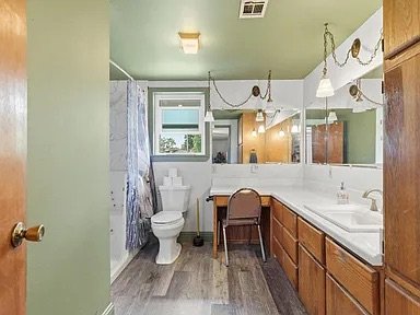 Full Bathroom — green ceiling, tub/shower, double vanity